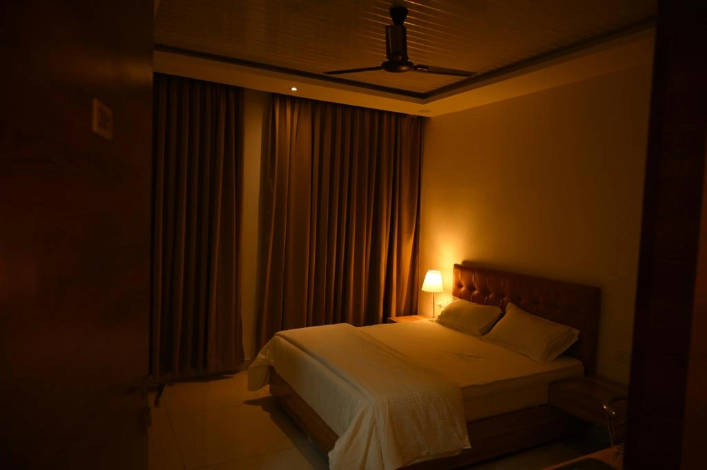 Super Deluxe Room with upgraded amenities at Hotel Hibiscus Tree